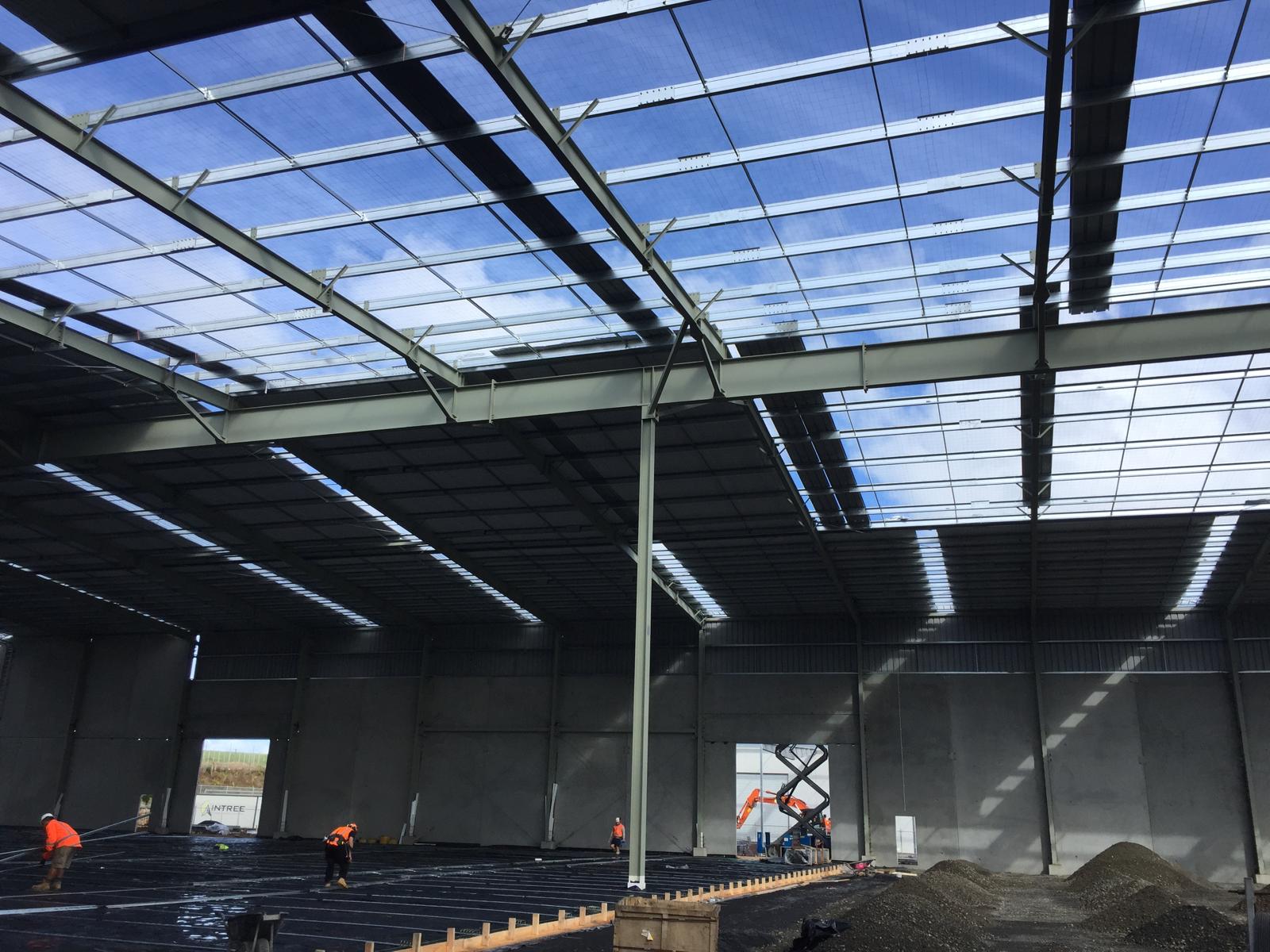 Warehouse steel portal frame under blue sky