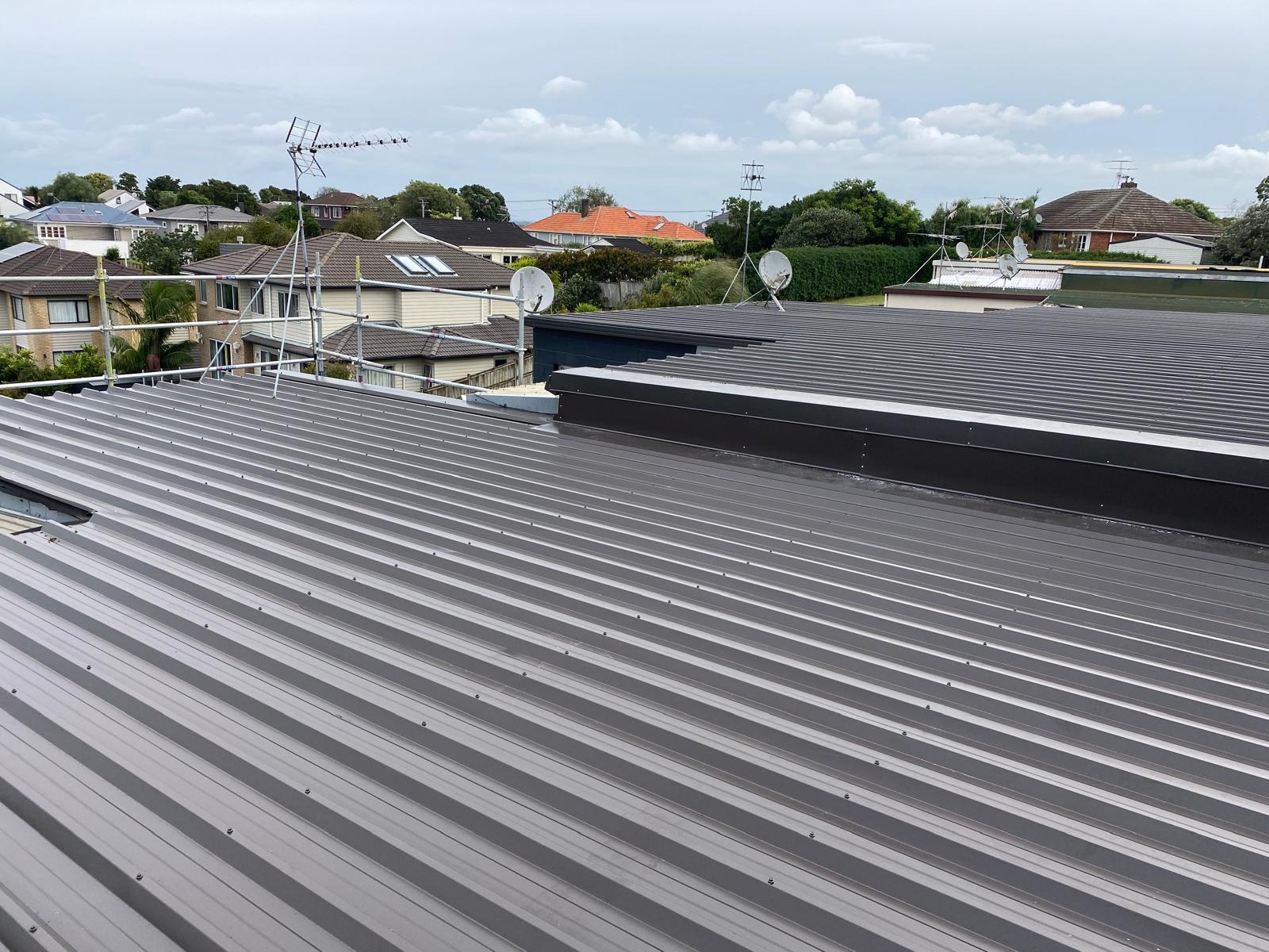 Grey tray roof completed on a suburban home