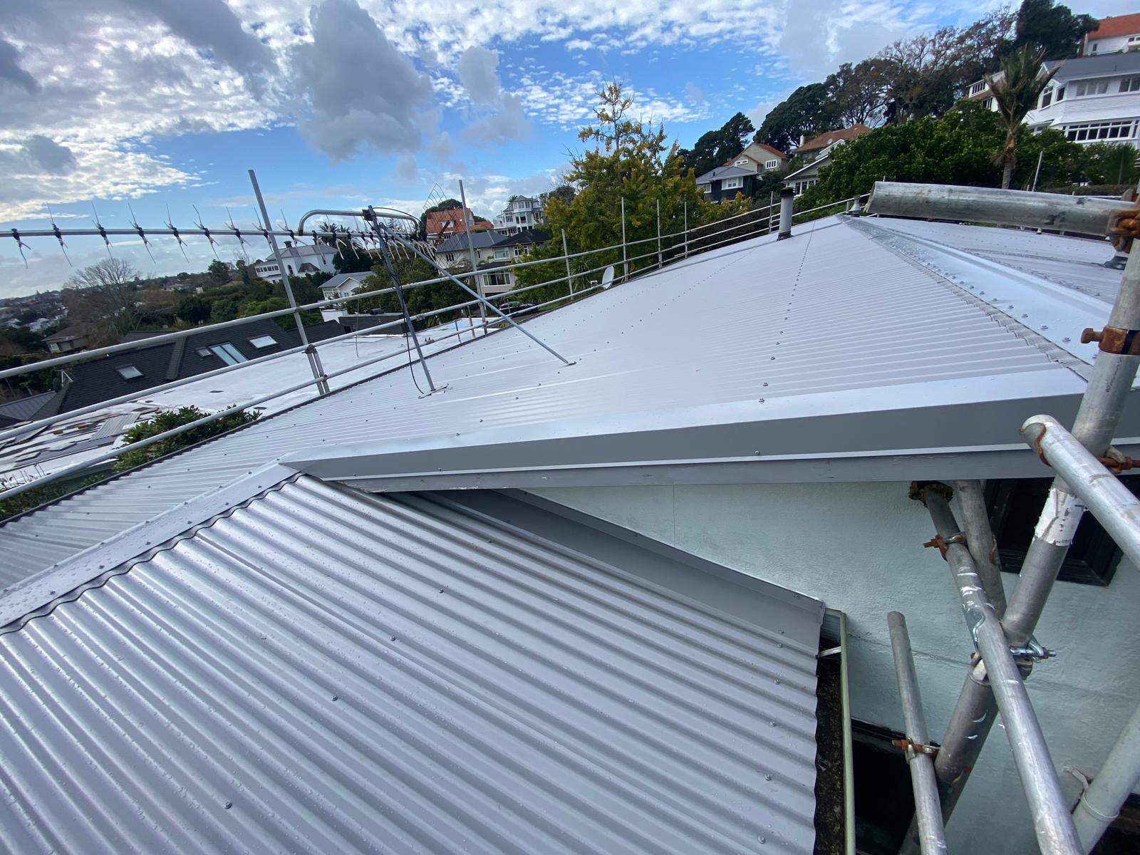 Silver hip roof on a residential property