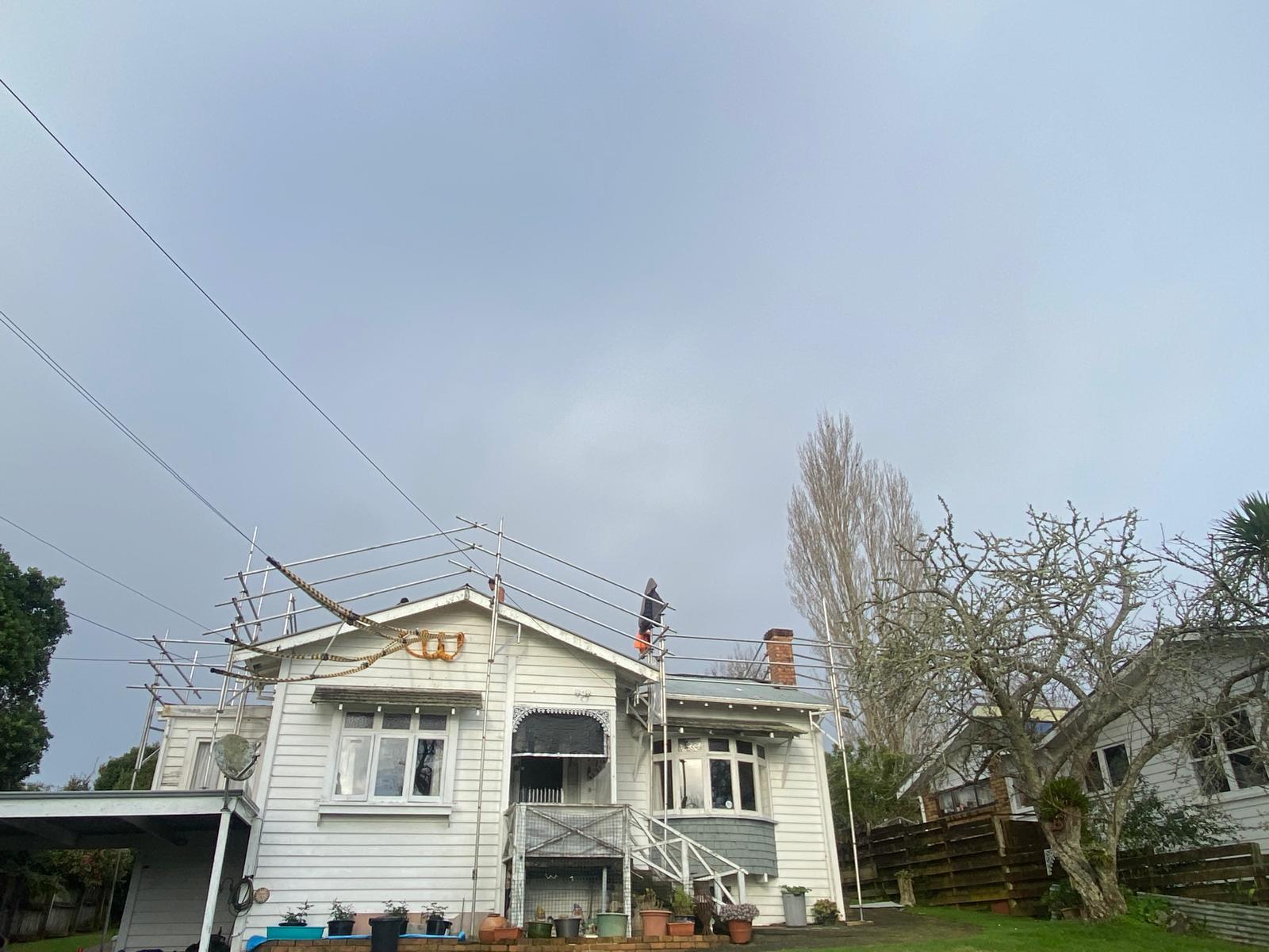 Scaffolded villa during a full re-roof